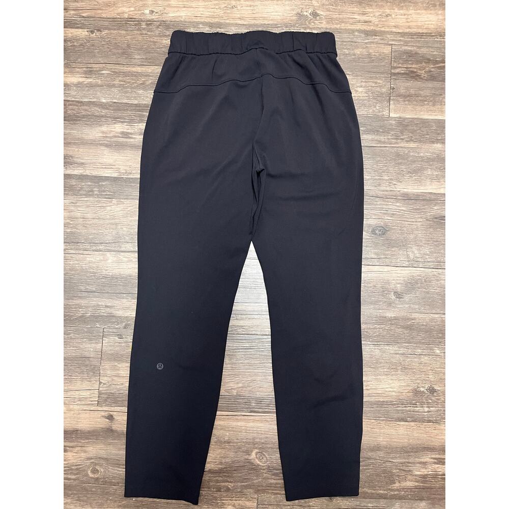 Lululemon On The Fly Pant Luxtreme Black 7/8 Sz 4 Jogger Athleisure Lounge Comfy - Picture 3 of 10